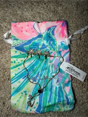 Lilly pulitzer NWT Gold Palm tree adjustable bracelet with bag